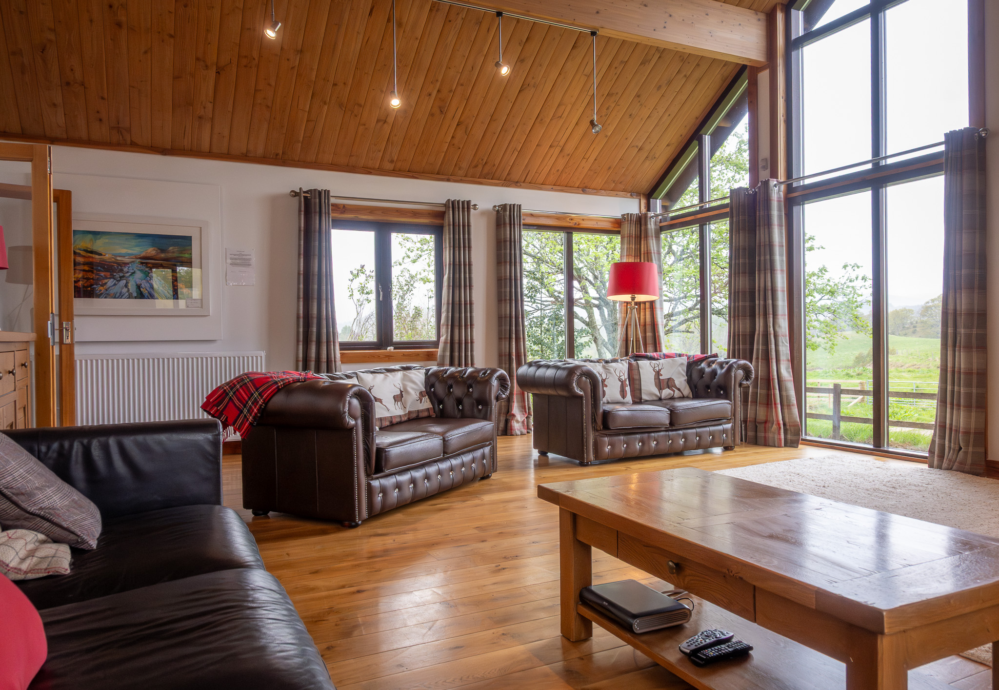 Balnacraig Lodge living room with floor-to-ceiling windows